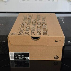 Nike Solid White Sneakers Womens Tanjun Size 11 White Swoop